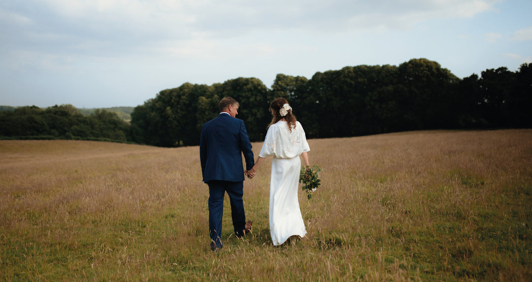 Thea Thompson wears T&H bespoke wedding dress