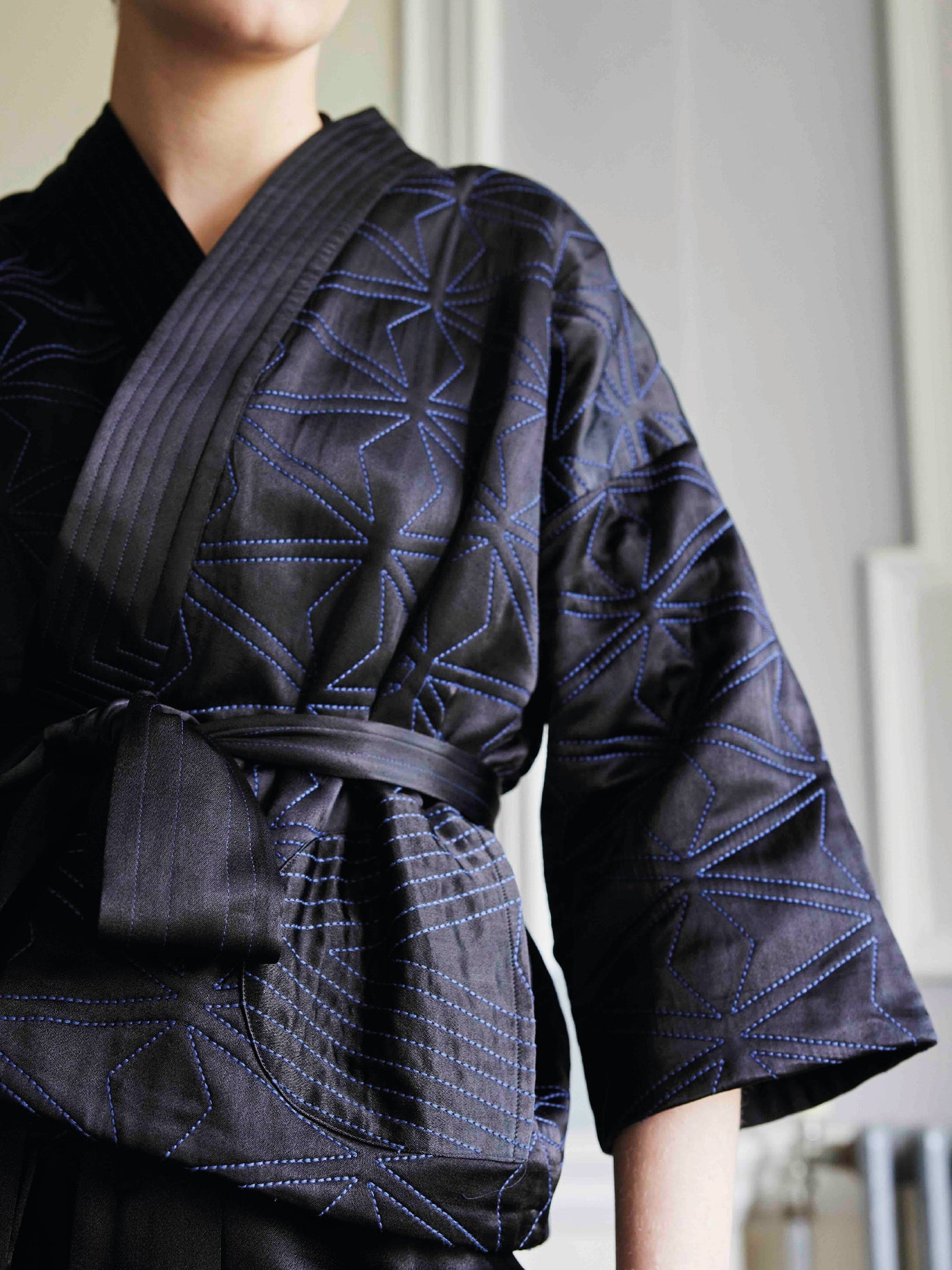 Quilted kimono jacket Black with petrol stitching